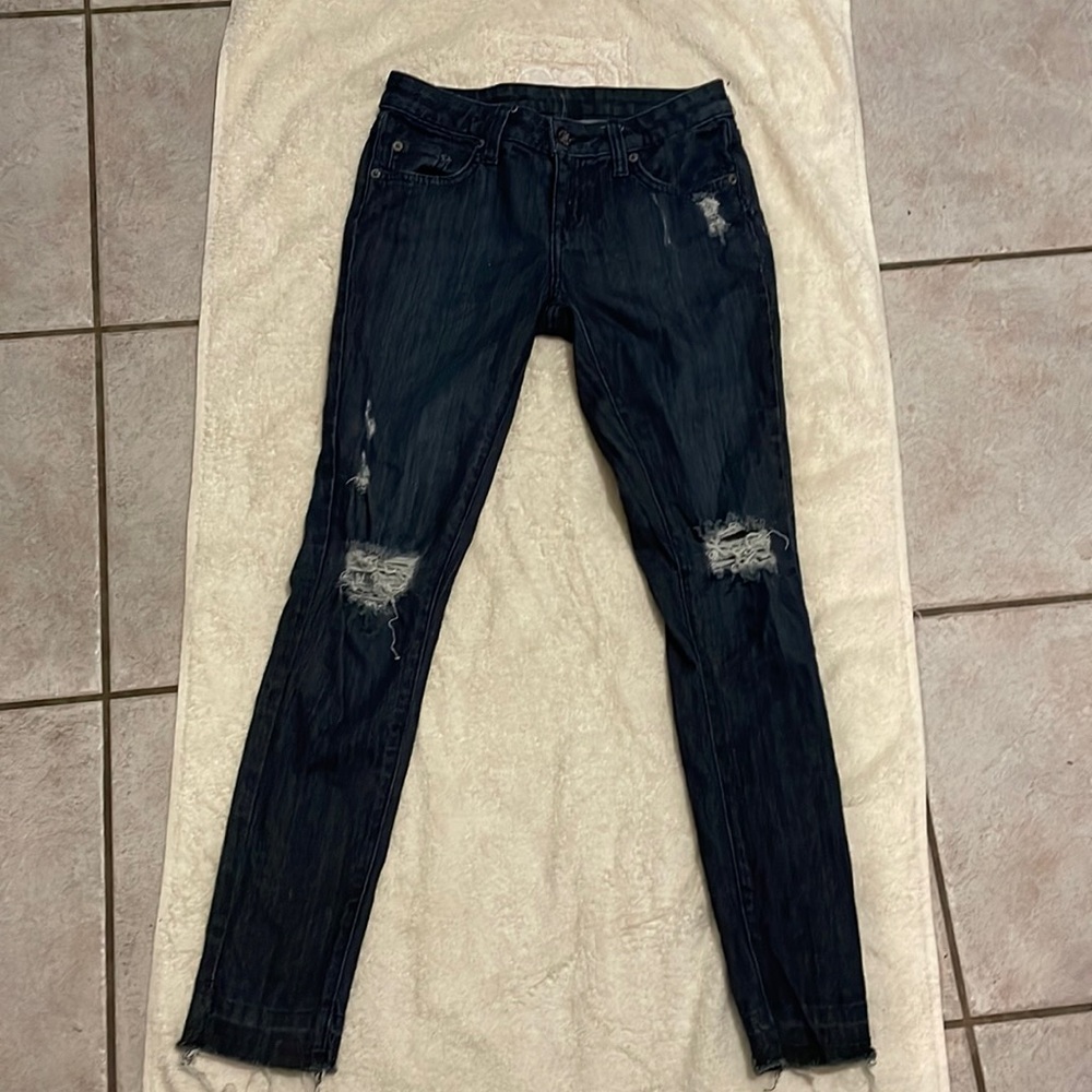 Carmar distressed jeans.